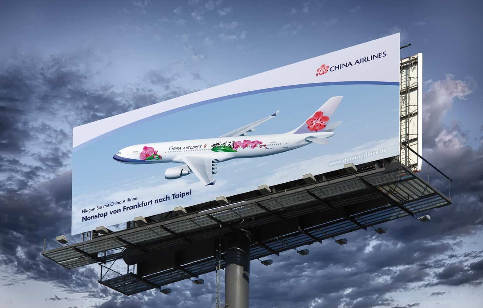 China Airlines billboard against a cloudy sky: an aircraft with a blossom motif and the line “Nonstop von Frankfurt nach Taipei”