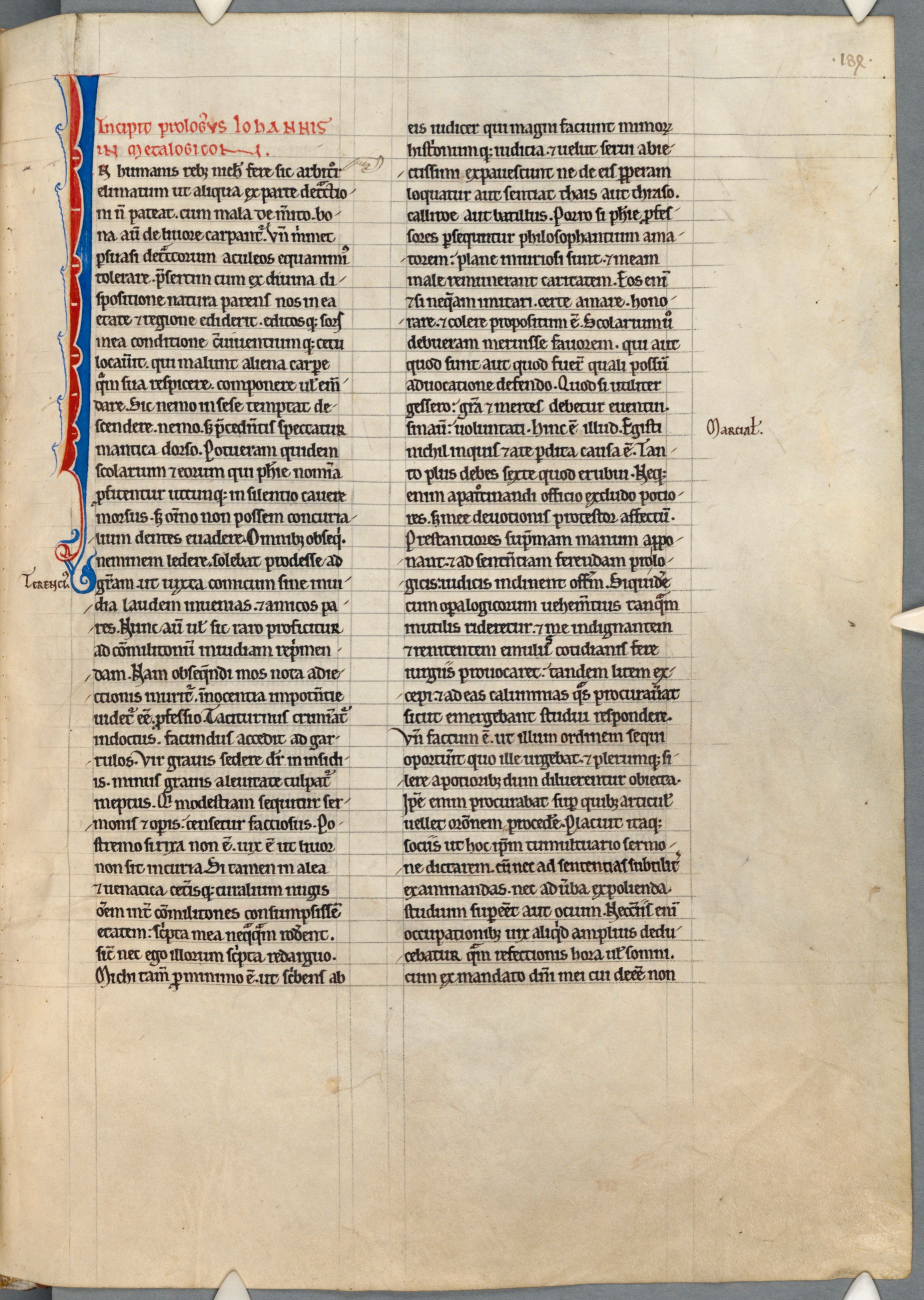 Medieval manuscript page in two columns with a decorated initial