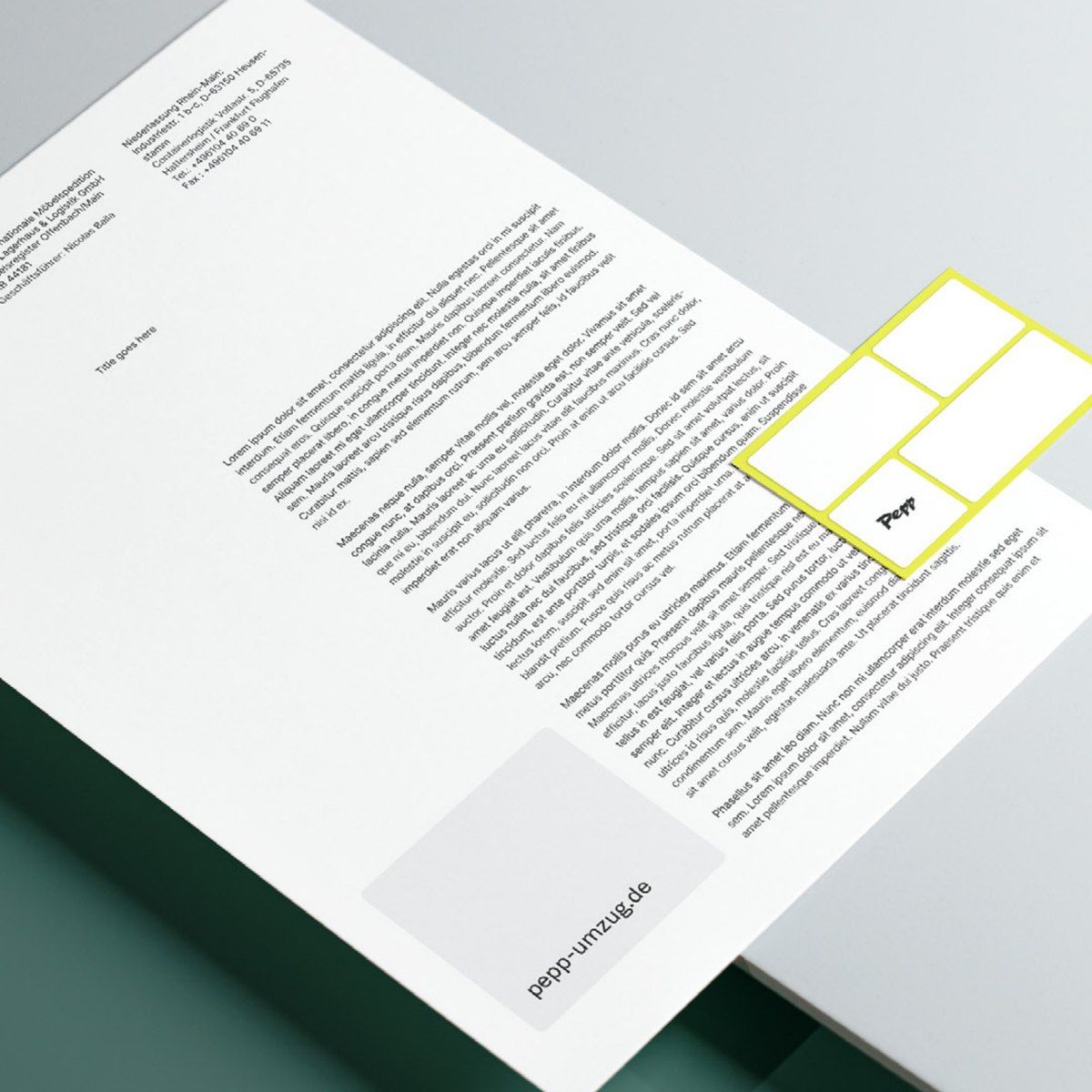 Pepp letterhead lying at an angle on a table, with a business card with a lime border on top