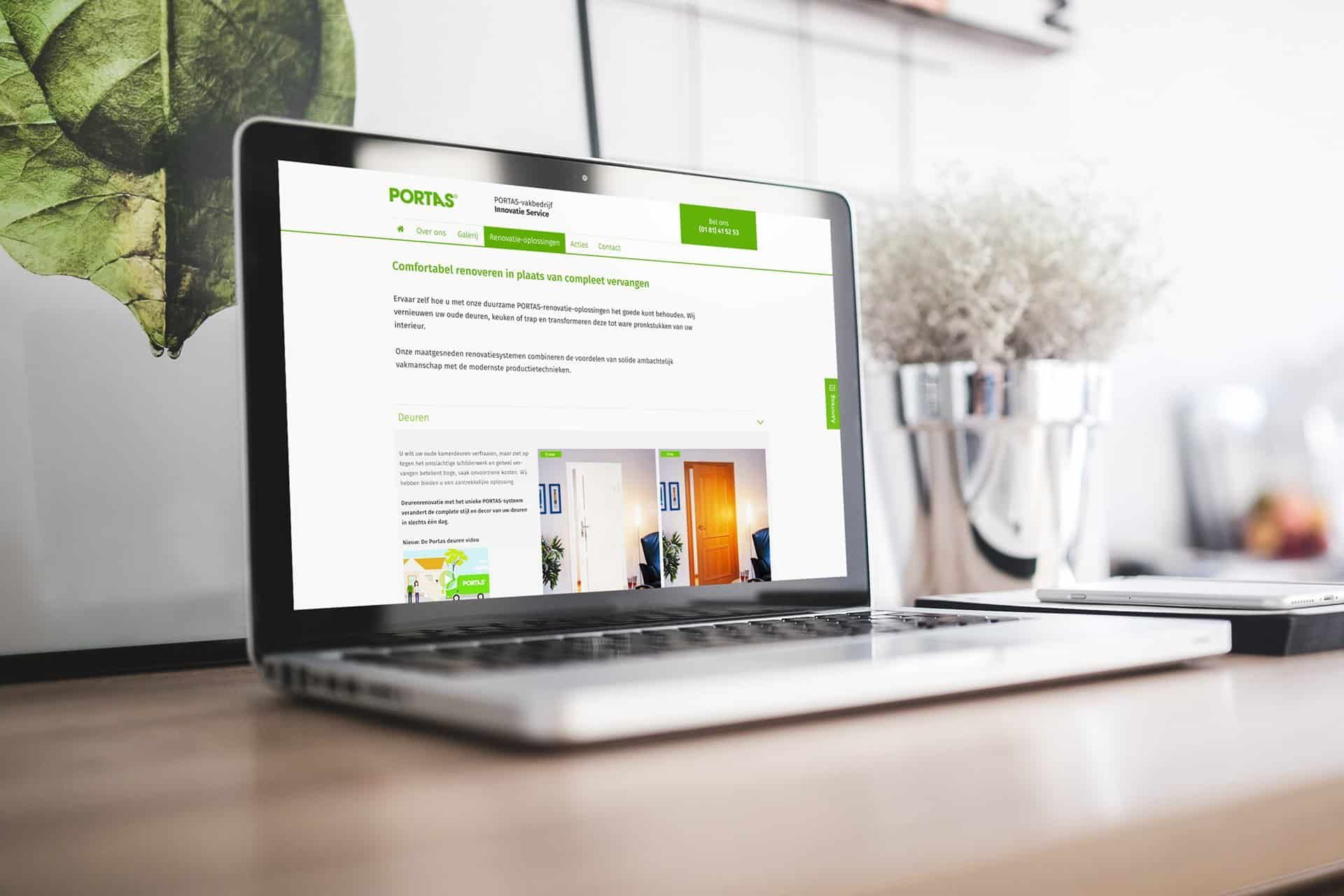 Laptop on a desk showing the Dutch website of a PORTAS franchise business, on the page about door renovation