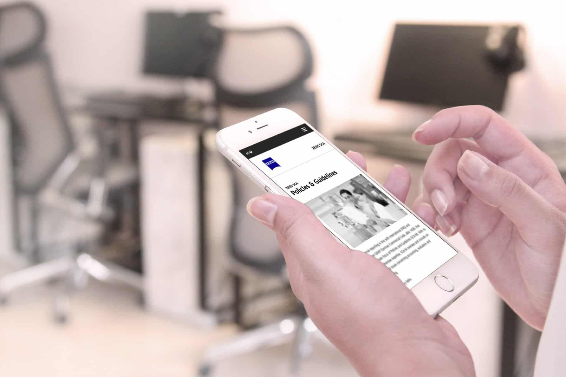 Smartphone showing the Policies & Guidelines page of the Carl Zeiss AG Shared Service Center intranet